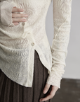 DOINDULGE Textured Knit Asymmetric Buttoned Long Sleeve Top