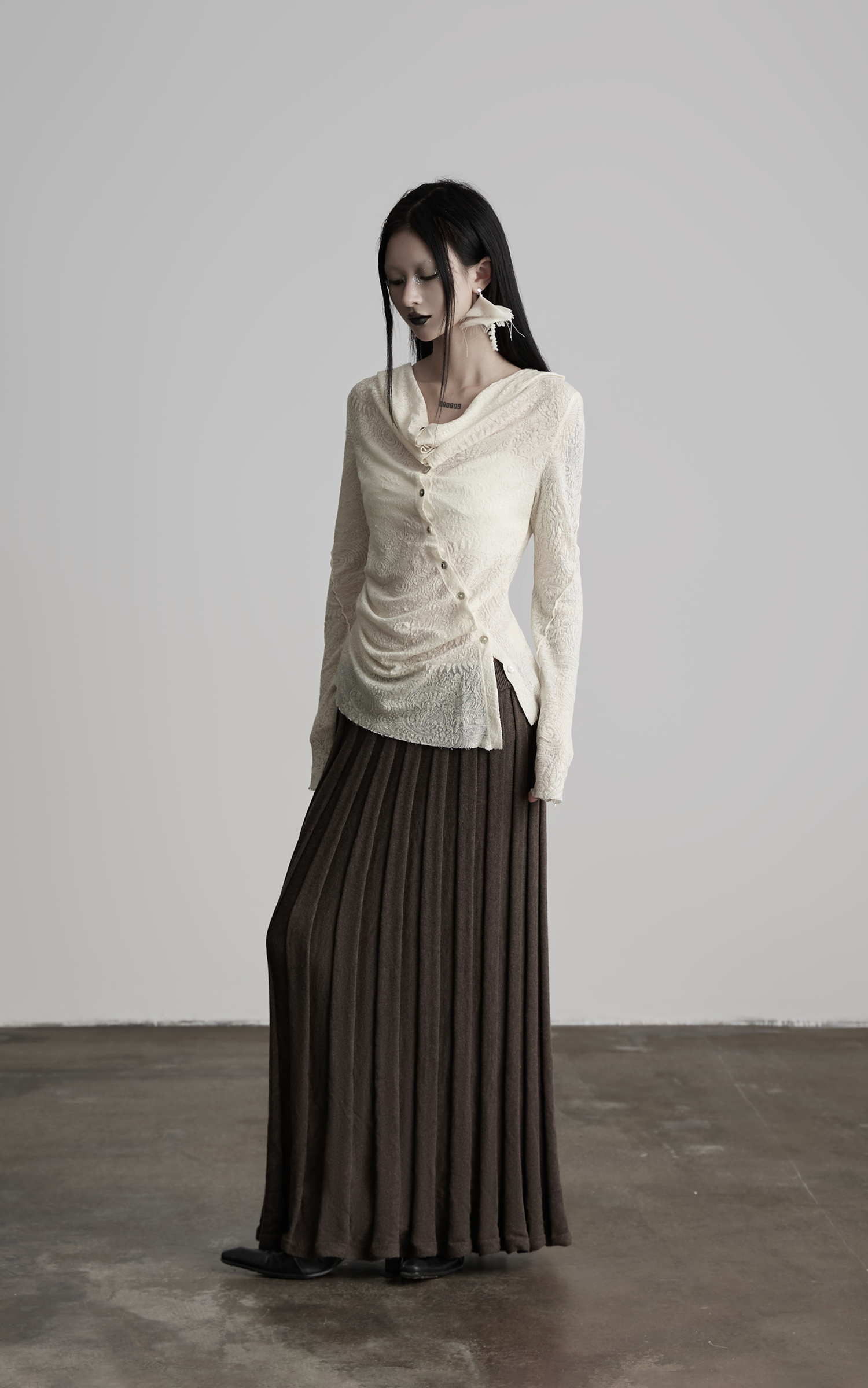 DOINDULGE Textured Knit Asymmetric Buttoned Long Sleeve Top