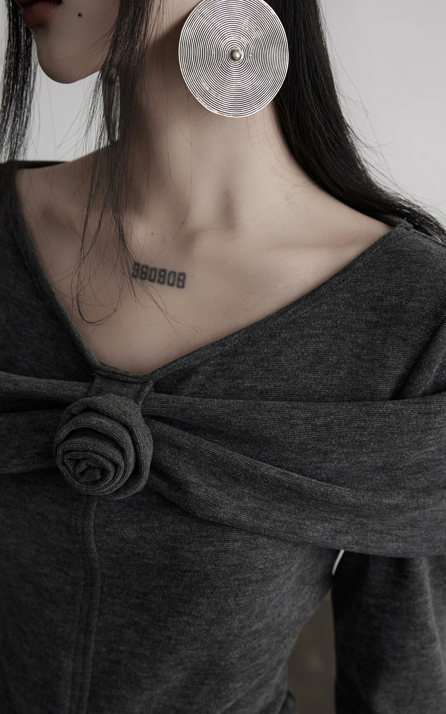 DOINDULGE Draped Knit Top with Rose Detail