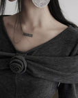 DOINDULGE Draped Knit Top with Rose Detail