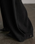 DOINDULGE Crinkled Wide Trousers with Red Thread