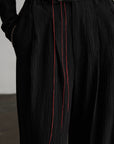 DOINDULGE Crinkled Wide Trousers with Red Thread