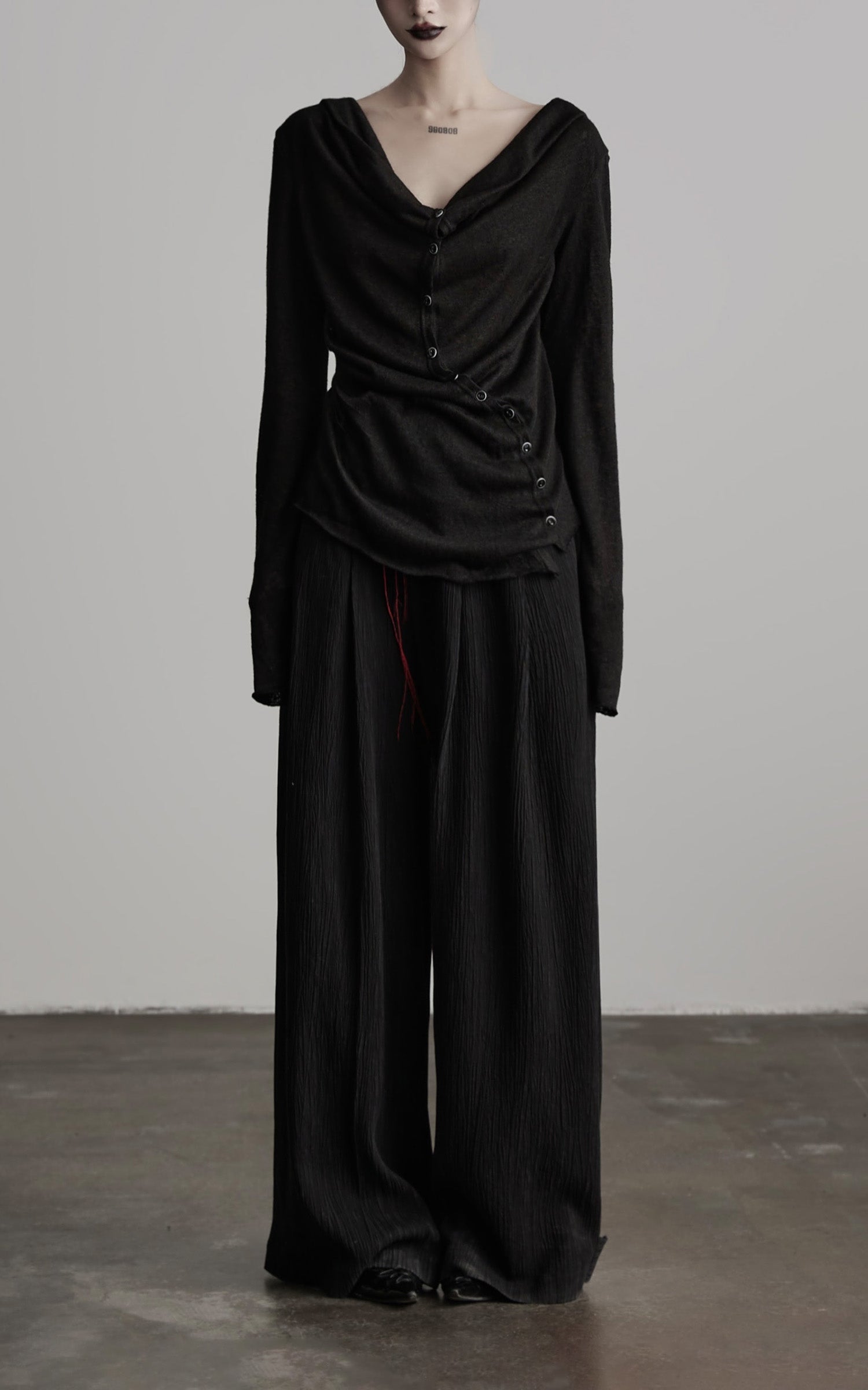 DOINDULGE Asymmetric Drape Long Sleeve Top with Deconstructed Button Design