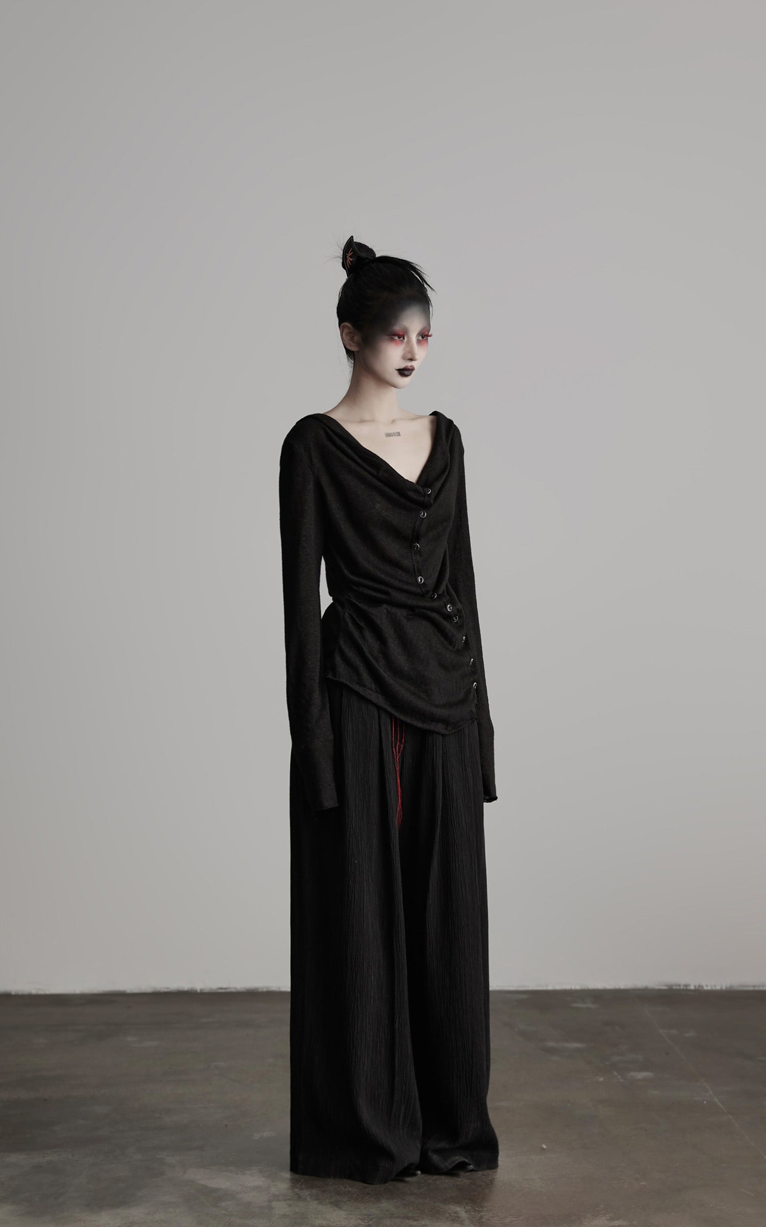 DOINDULGE Asymmetric Drape Long Sleeve Top with Deconstructed Button Design
