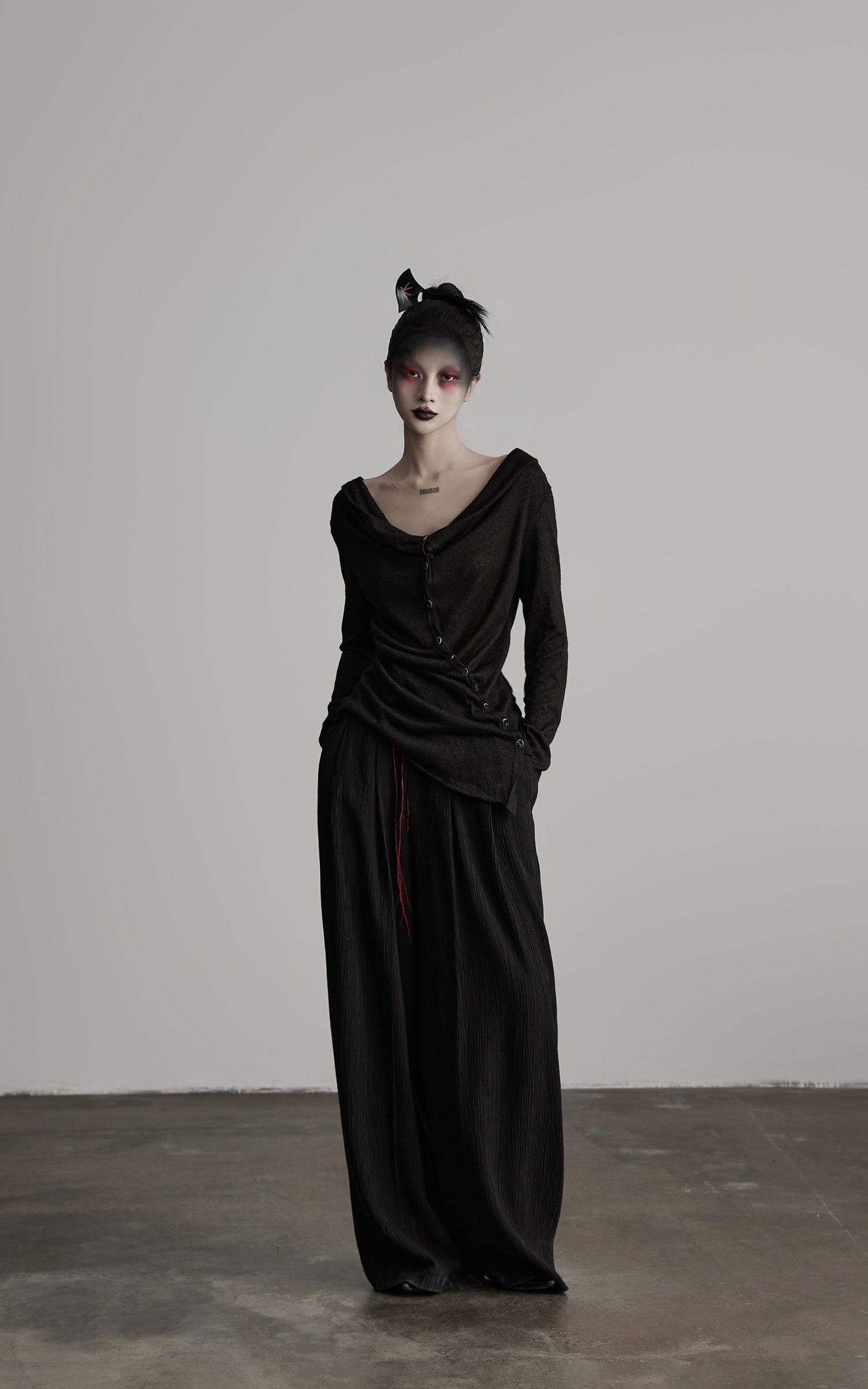 DOINDULGE Asymmetric Drape Long Sleeve Top with Deconstructed Button Design