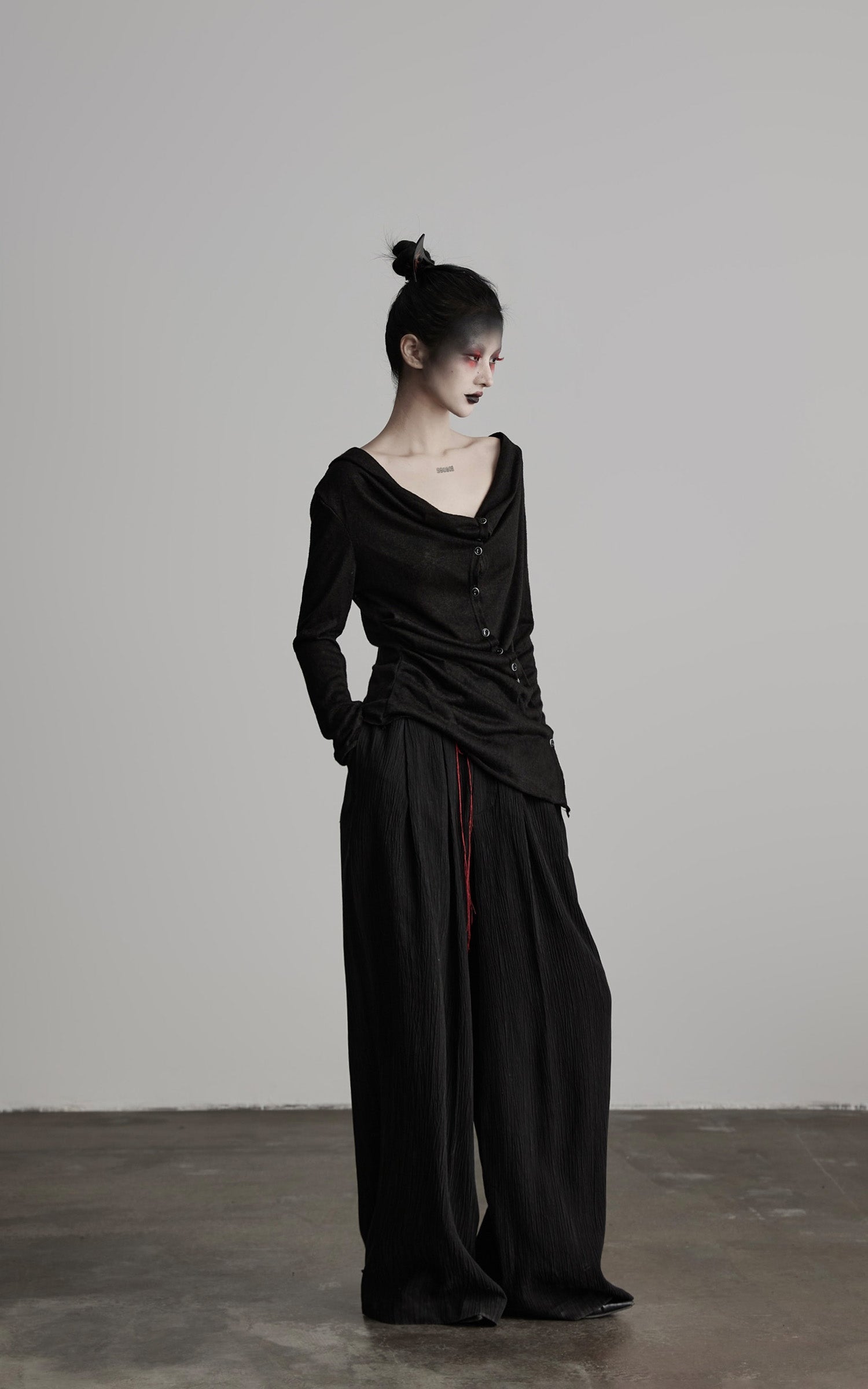 DOINDULGE Asymmetric Drape Long Sleeve Top with Deconstructed Button Design