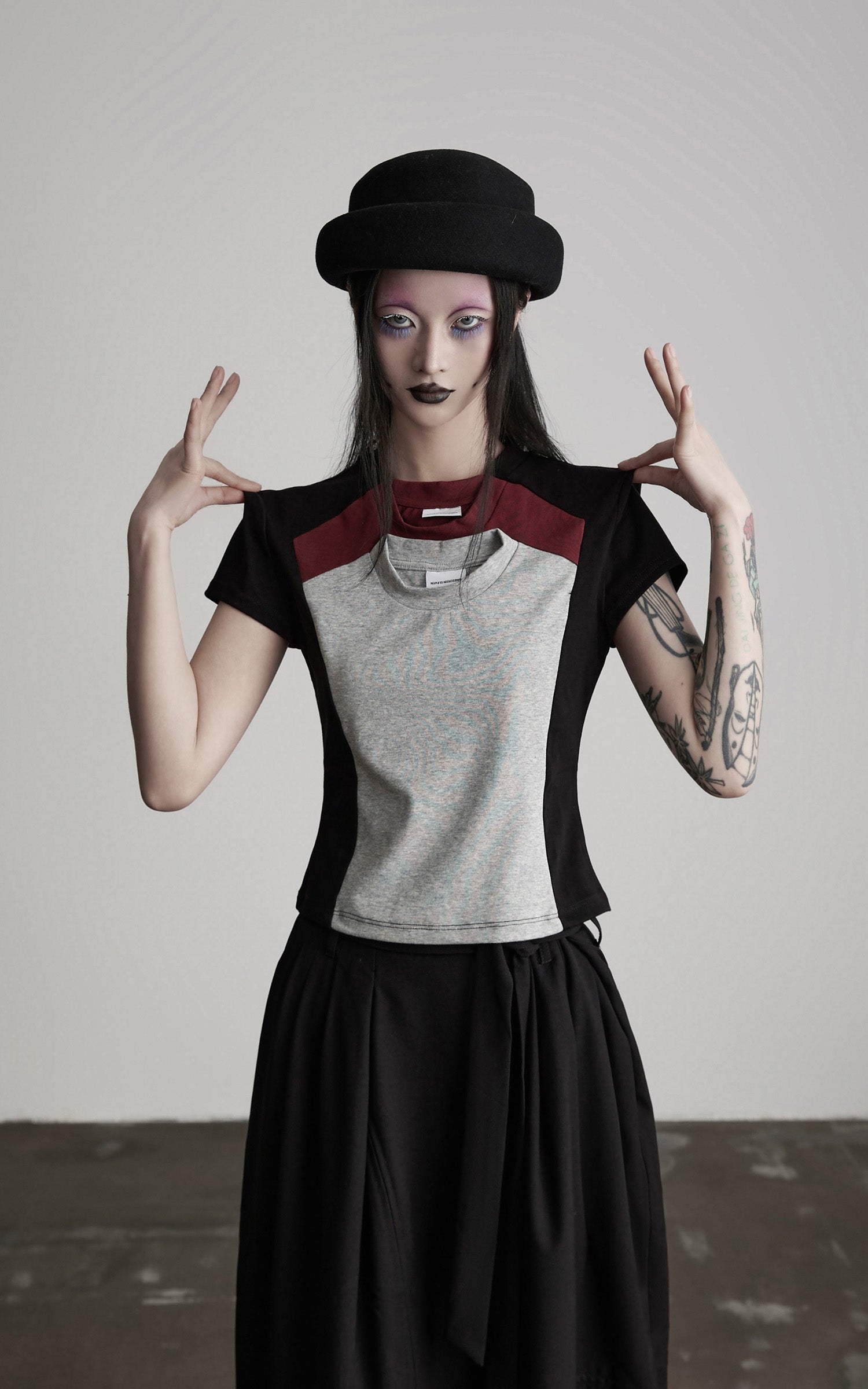 DOINDULGE Paneled Cutout T-Shirt with Layered Collar