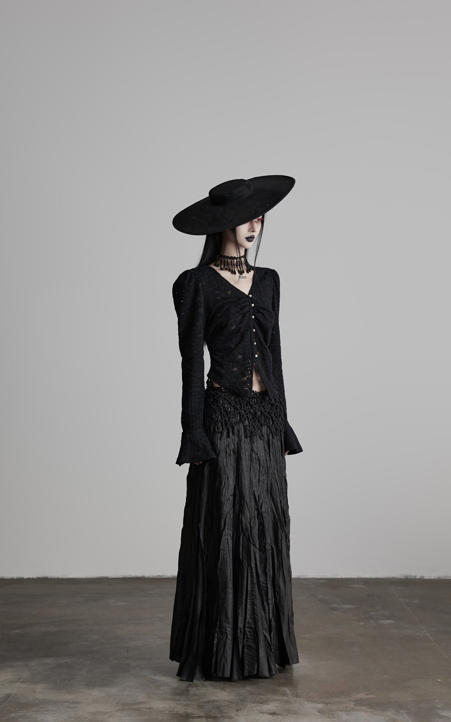 DOINDULGE Crushed Maxi Skirt with 3D Knotwork Waistband