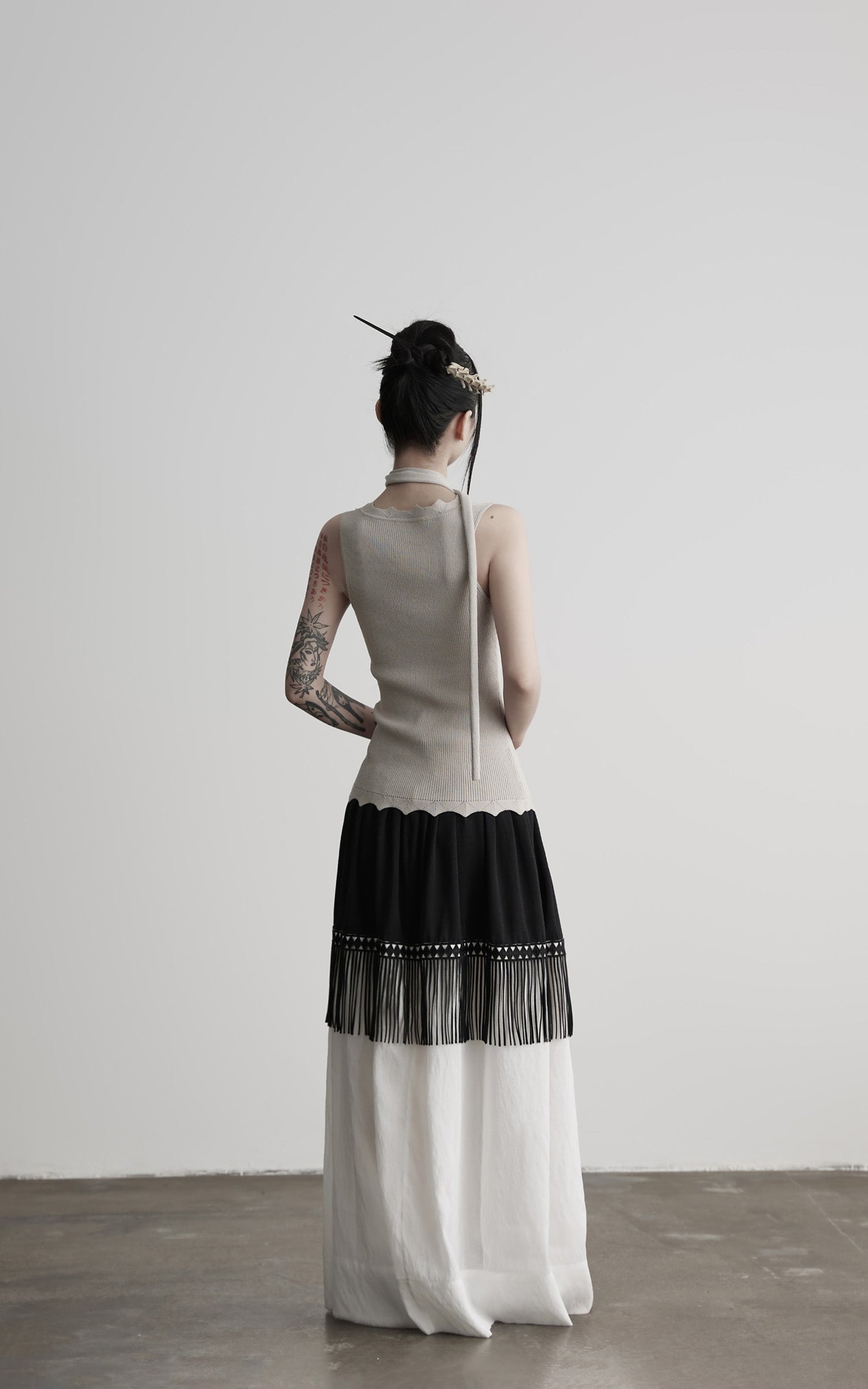 DOINDULGE Fringe Paneled Layered Skirt with Pleats and Contrast Hem