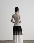 DOINDULGE Fringe Paneled Layered Skirt with Pleats and Contrast Hem