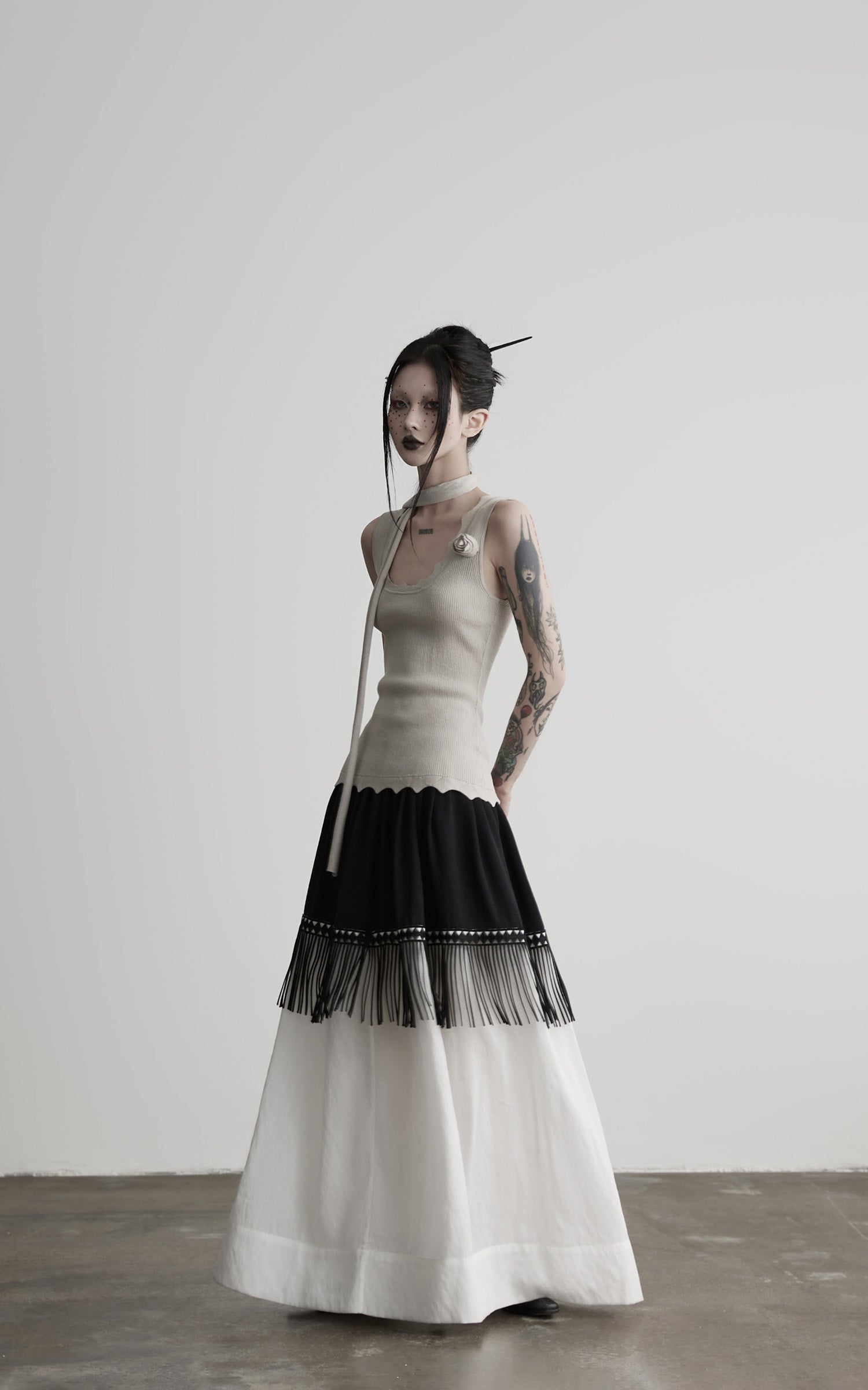 DOINDULGE Fringe Paneled Layered Skirt with Pleats and Contrast Hem