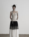 DOINDULGE Fringe Paneled Layered Skirt with Pleats and Contrast Hem