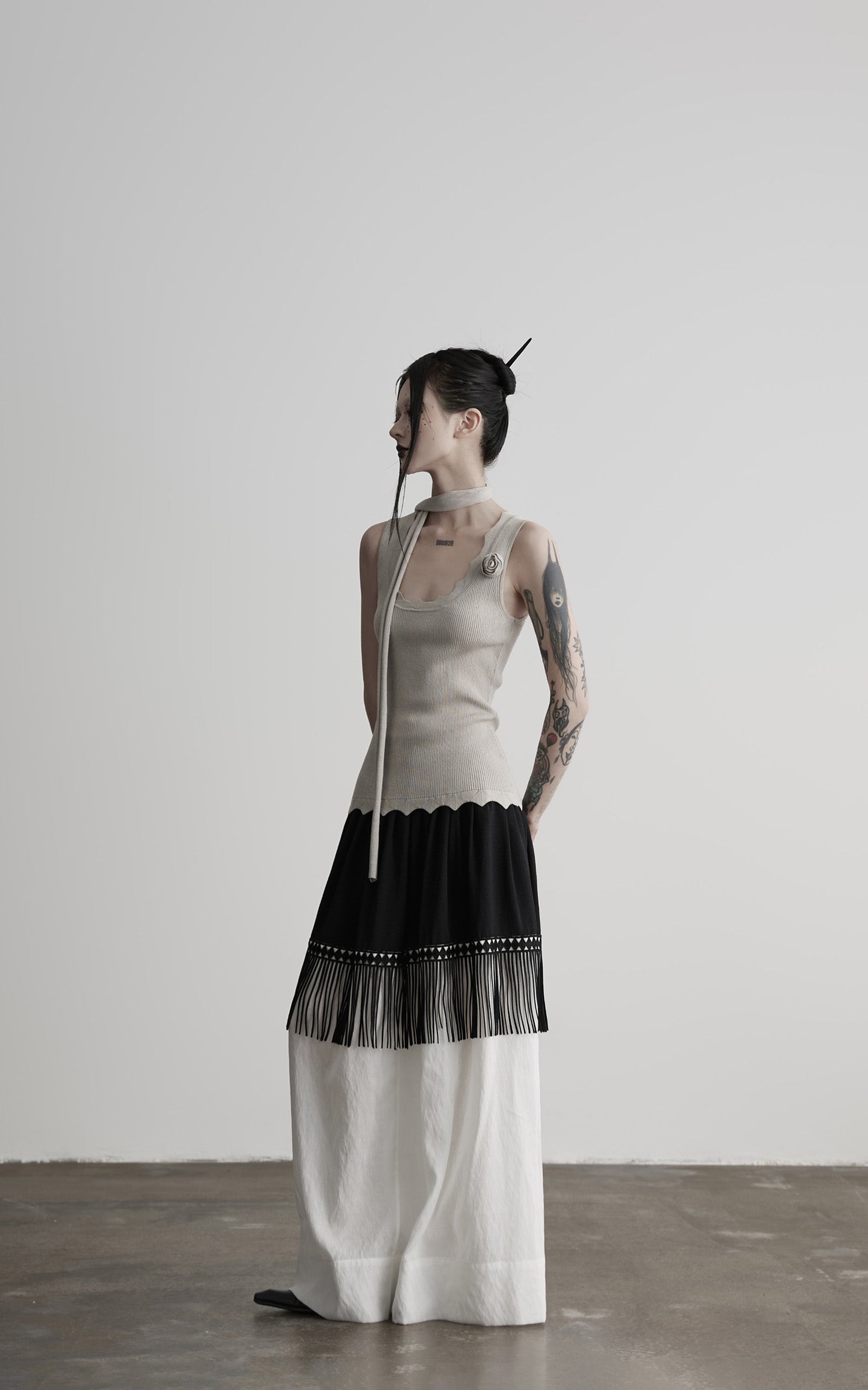 DOINDULGE Fringe Paneled Layered Skirt with Pleats and Contrast Hem