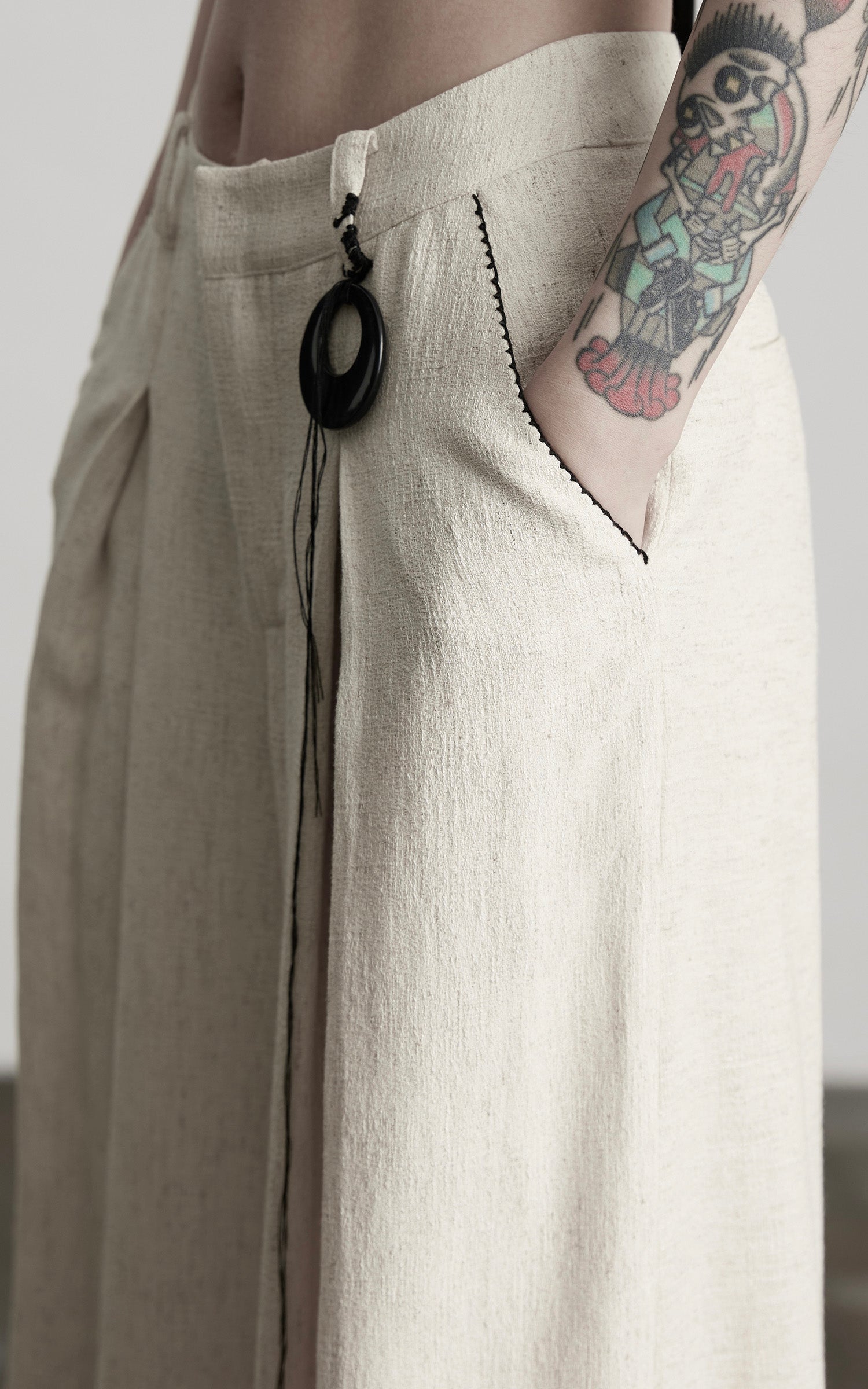 DOINDULGE Raw-Texture Wide-Leg Pants with Hand-Stitched Details