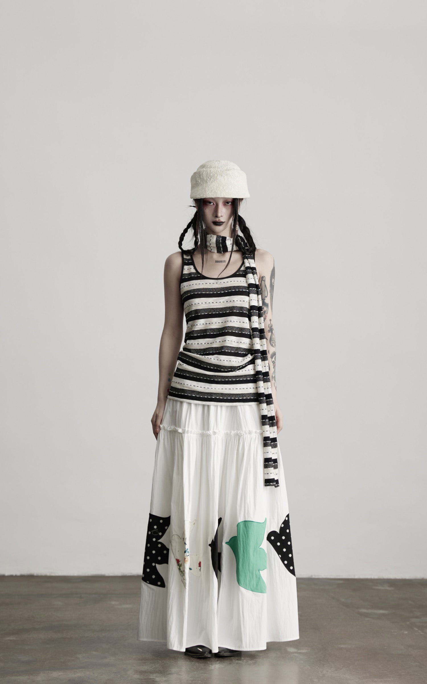 DOINDULGE Bird Patch Panel Maxi Skirt with Raw Volume Silhouette