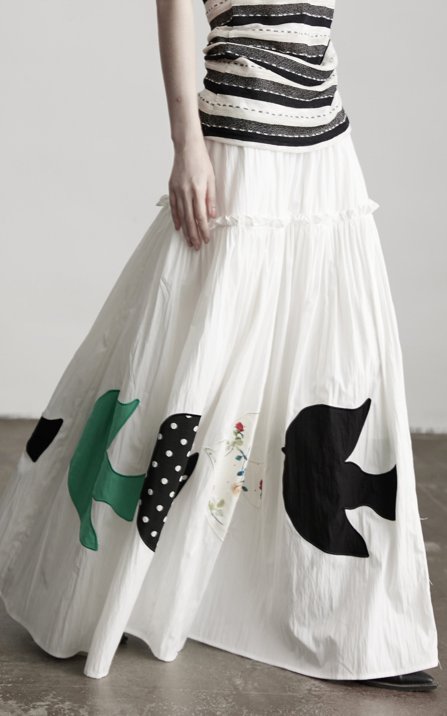 DOINDULGE Bird Patch Panel Maxi Skirt with Raw Volume Silhouette
