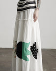DOINDULGE Bird Patch Panel Maxi Skirt with Raw Volume Silhouette
