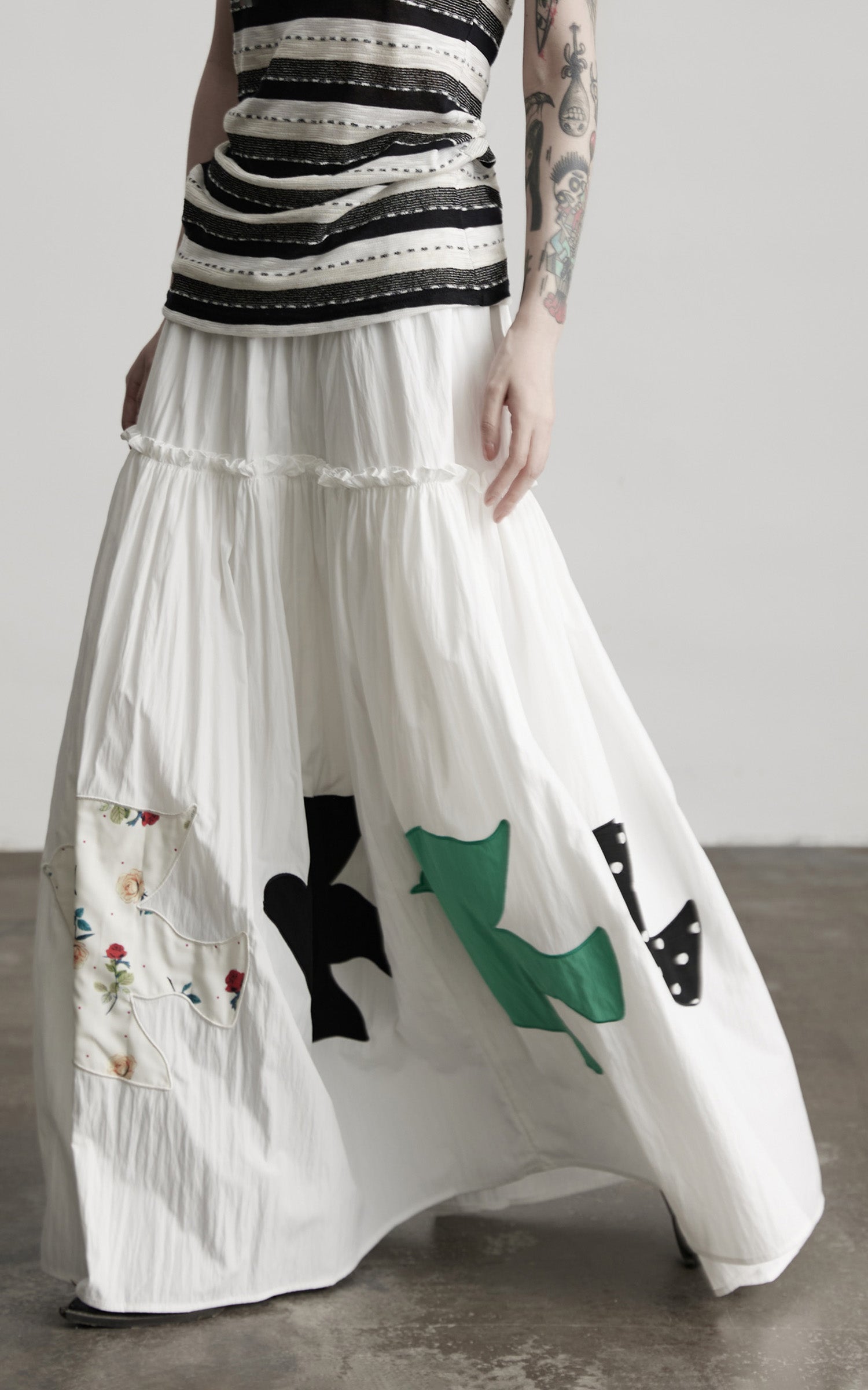 DOINDULGE Bird Patch Panel Maxi Skirt with Raw Volume Silhouette