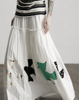 DOINDULGE Bird Patch Panel Maxi Skirt with Raw Volume Silhouette