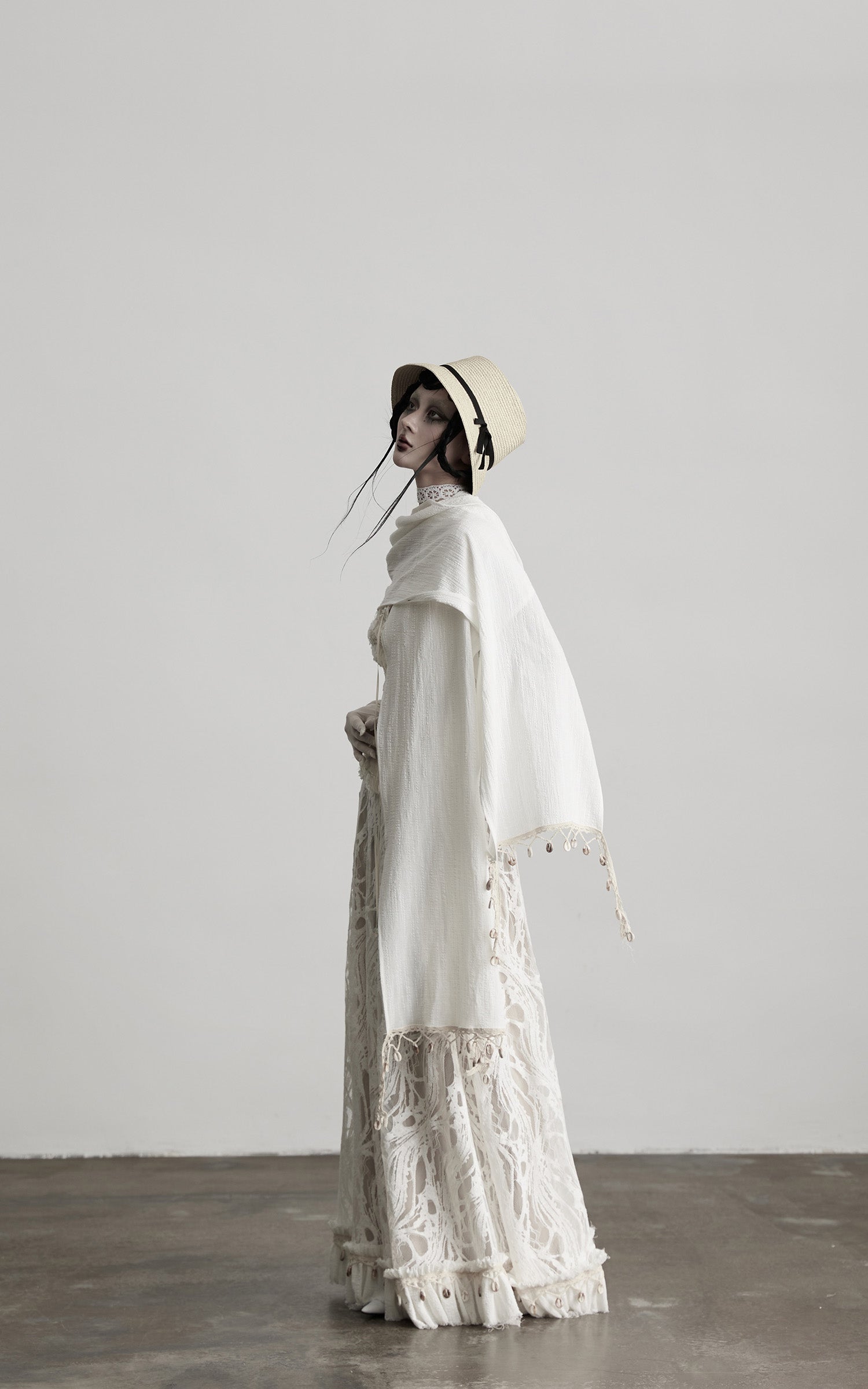 DOINDULGE Embroidered Lace Patchwork Maxi Skirt with Draped Overlay and Shell Trim