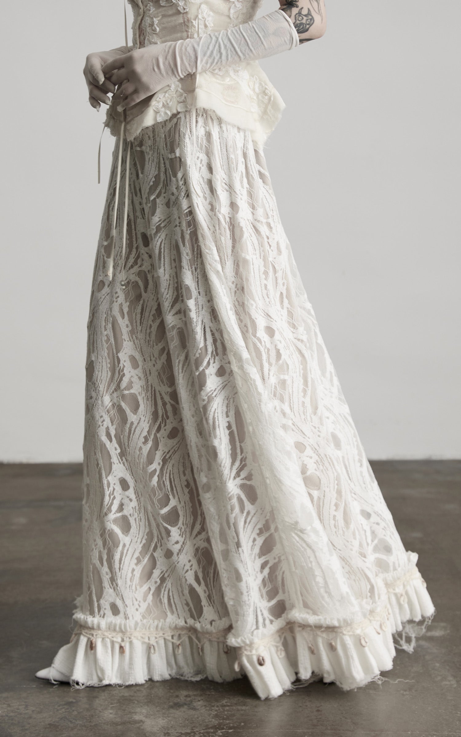 DOINDULGE Embroidered Lace Patchwork Maxi Skirt with Draped Overlay and Shell Trim