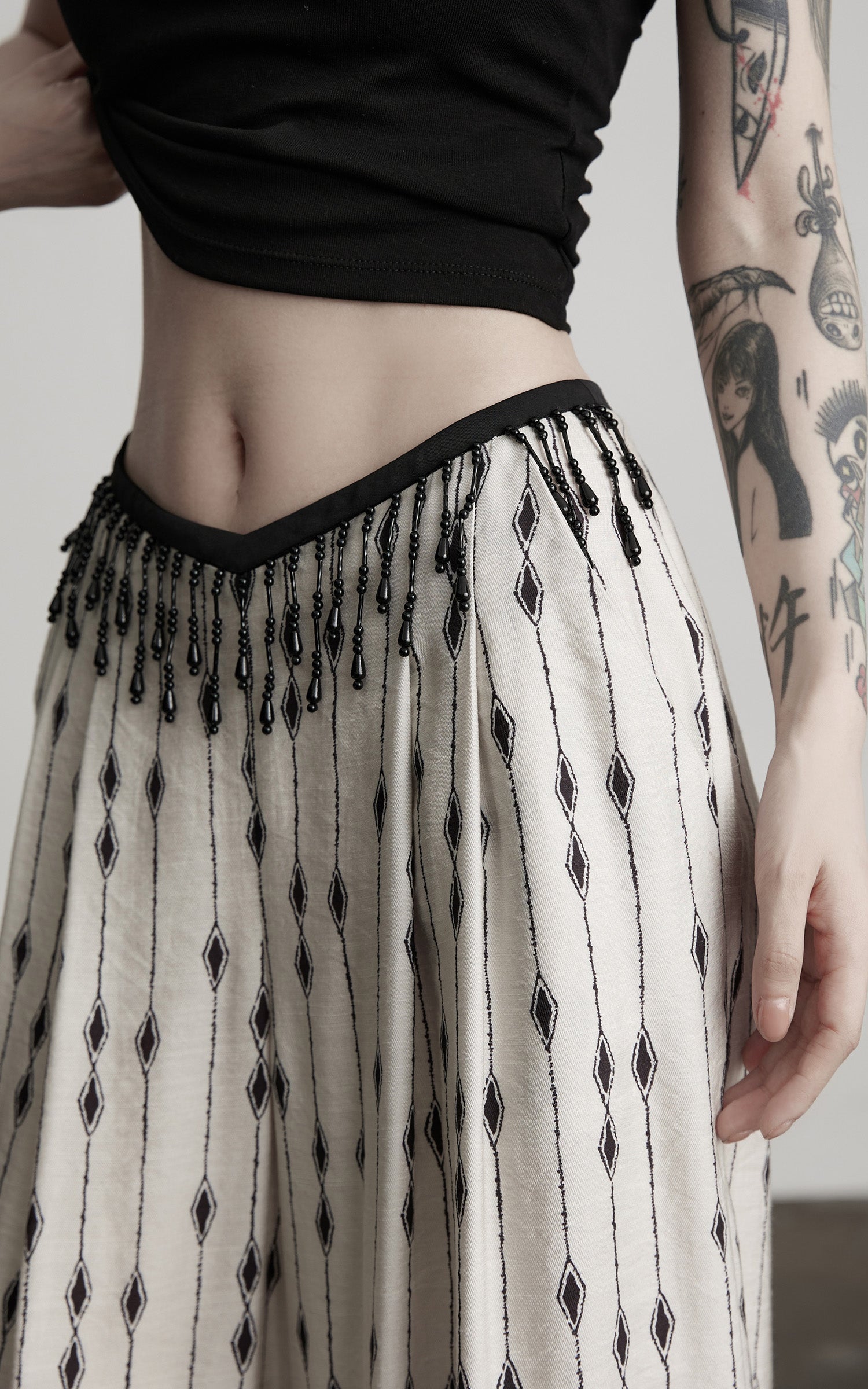 DOINDULGE Embellished Wide-Leg Pants with Beaded Draped Waistline