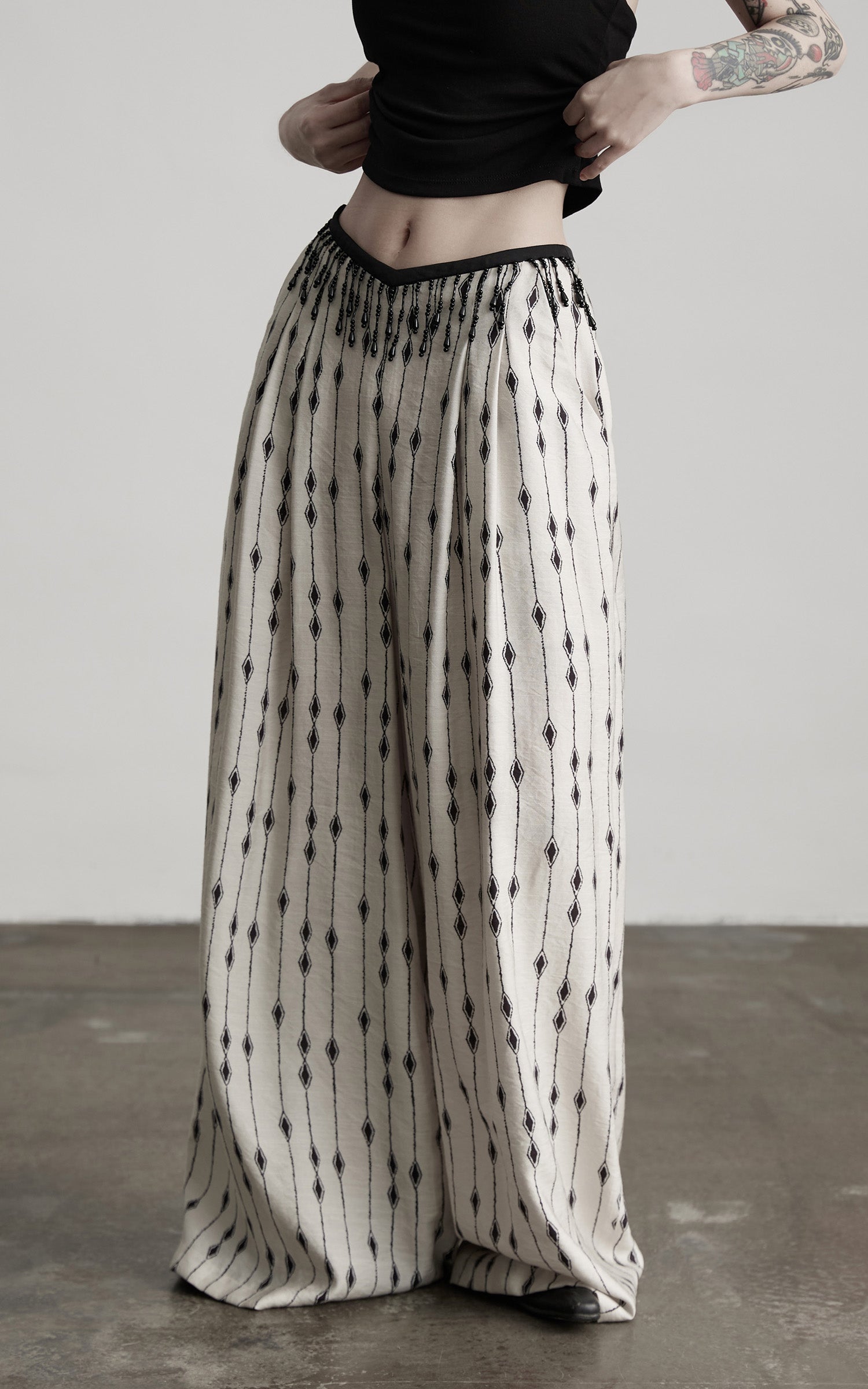 DOINDULGE Embellished Wide-Leg Pants with Beaded Draped Waistline
