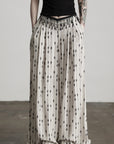 DOINDULGE Embellished Wide-Leg Pants with Beaded Draped Waistline