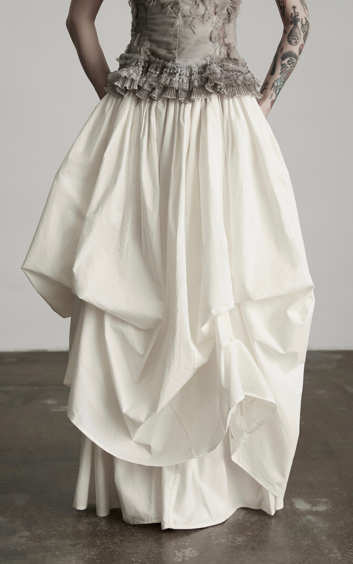 DOINDULGE Layered Cotton Skirt with Asymmetric Draped Hem