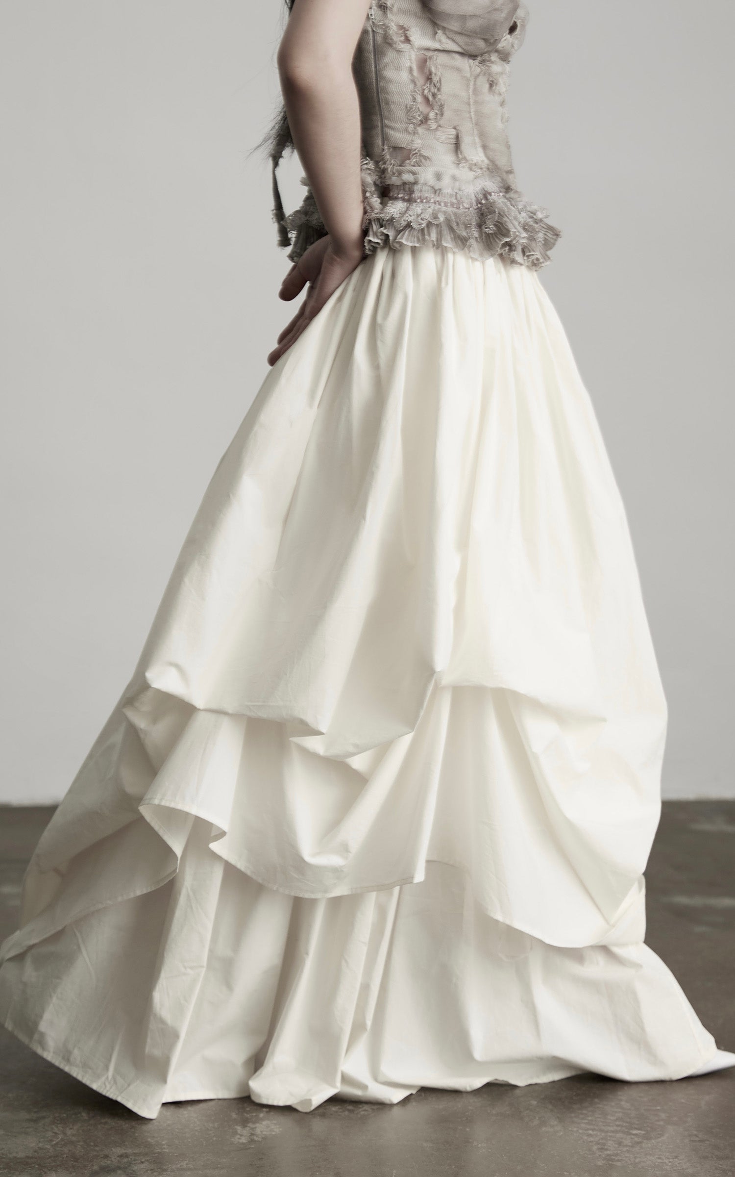 DOINDULGE Layered Cotton Skirt with Asymmetric Draped Hem