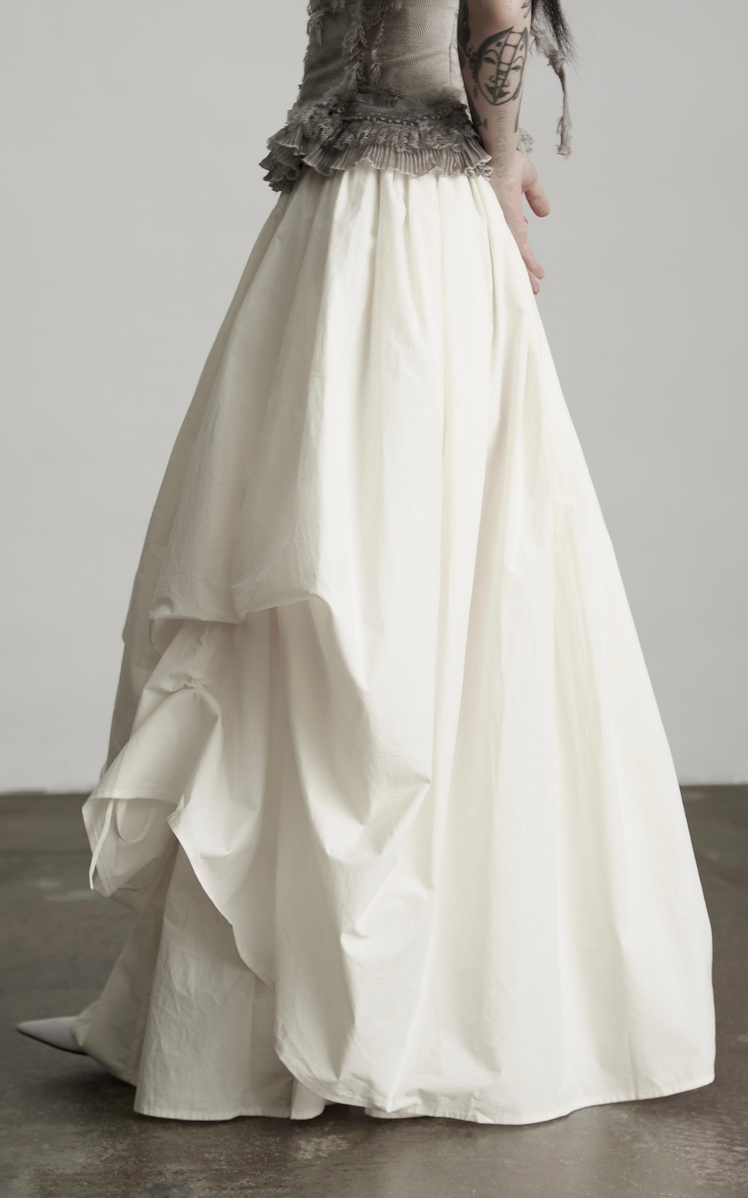 DOINDULGE Layered Cotton Skirt with Asymmetric Draped Hem
