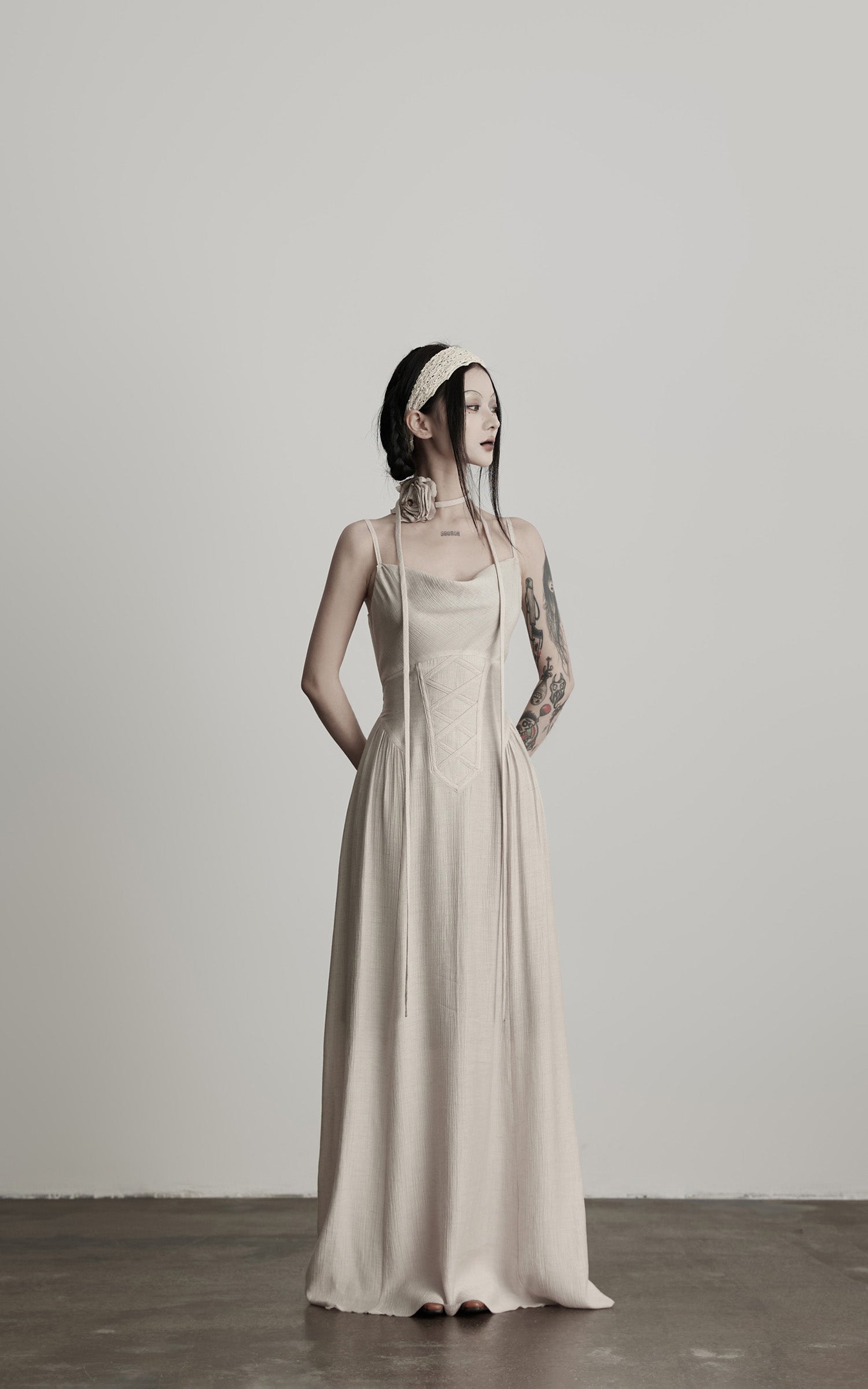 DOINDULGE Draped Maxi Dress with Corset Waist and Rosette Detail