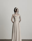 DOINDULGE Draped Maxi Dress with Corset Waist and Rosette Detail