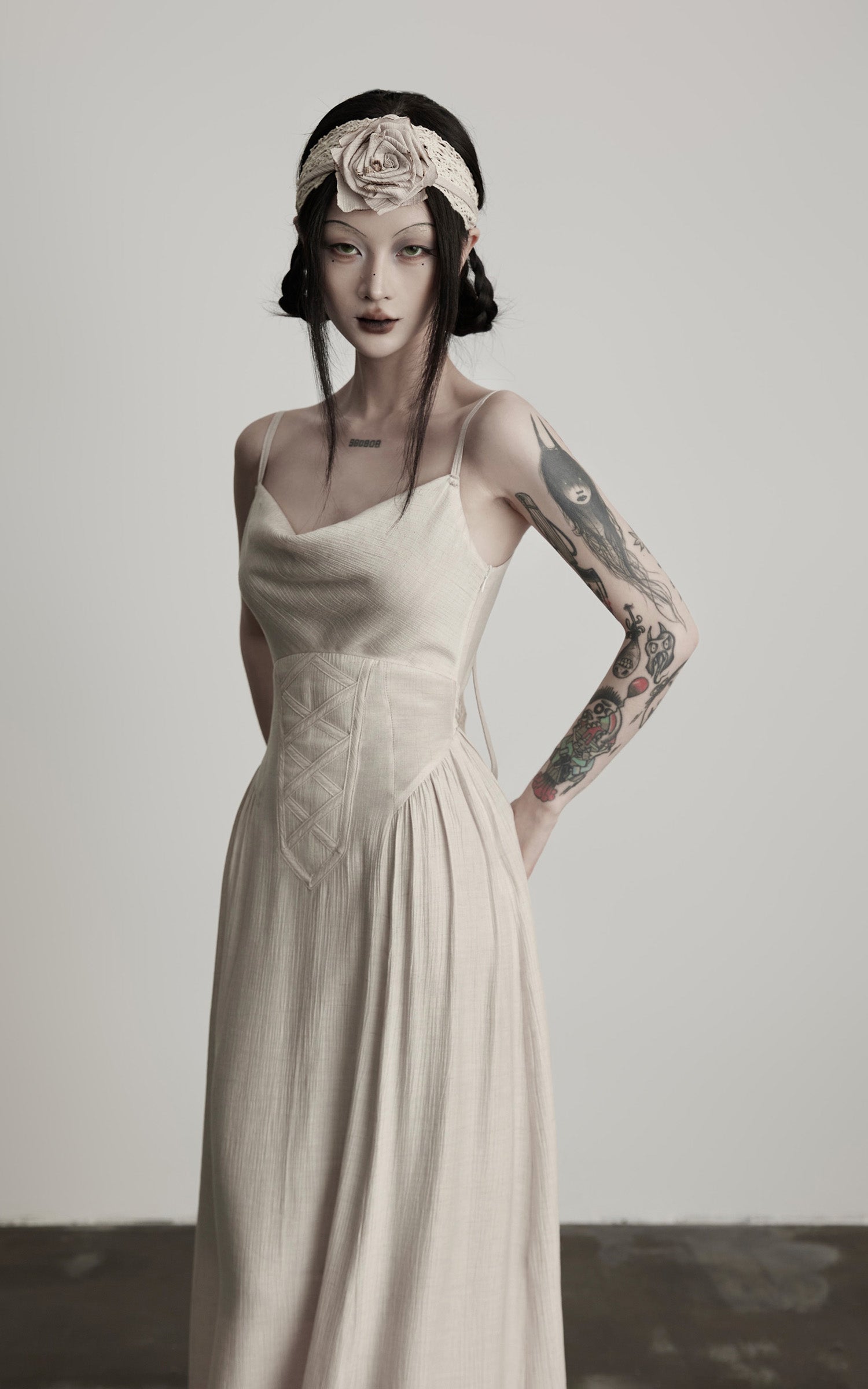 DOINDULGE Draped Maxi Dress with Corset Waist and Rosette Detail