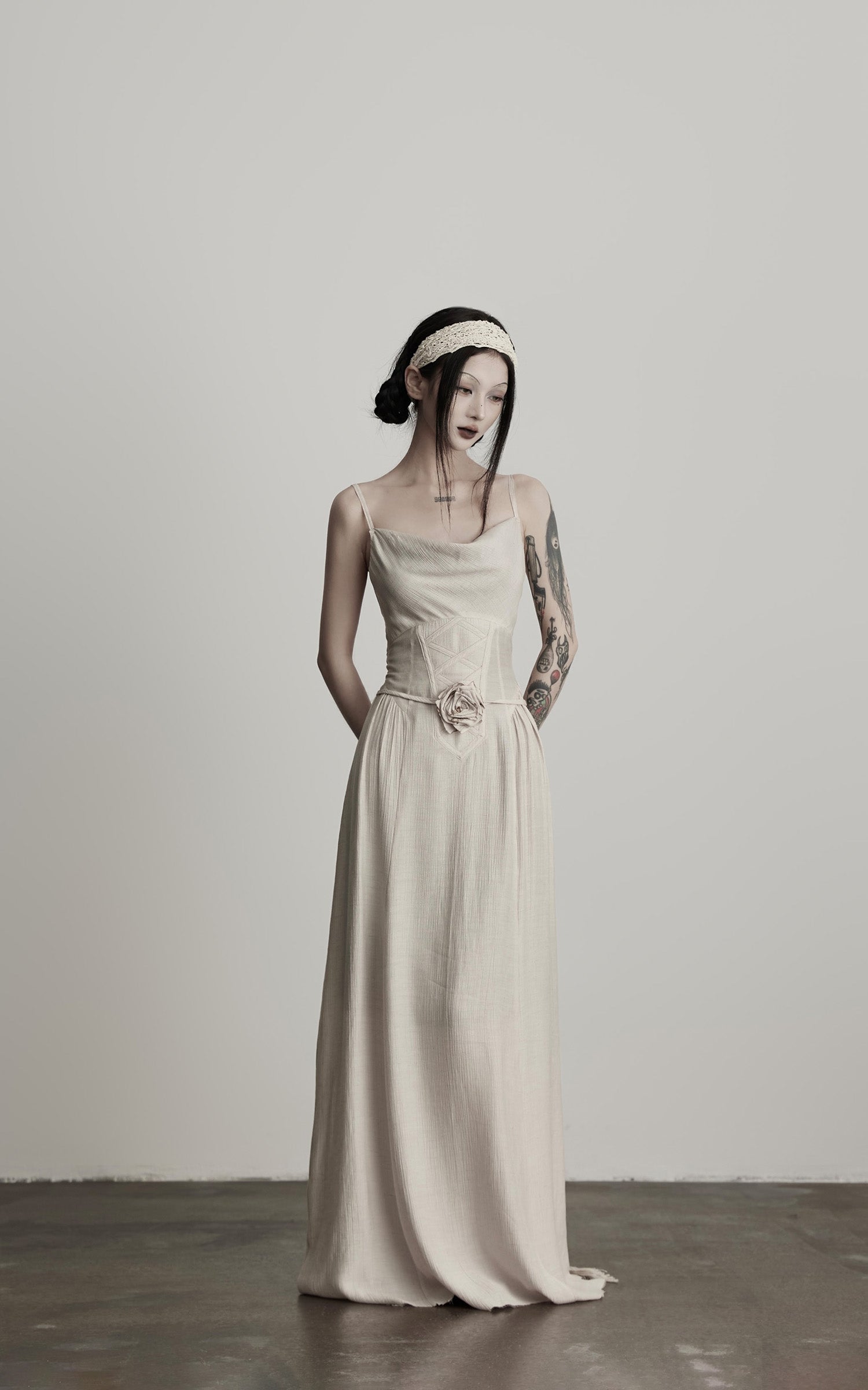 DOINDULGE Draped Maxi Dress with Corset Waist and Rosette Detail