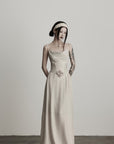 DOINDULGE Draped Maxi Dress with Corset Waist and Rosette Detail