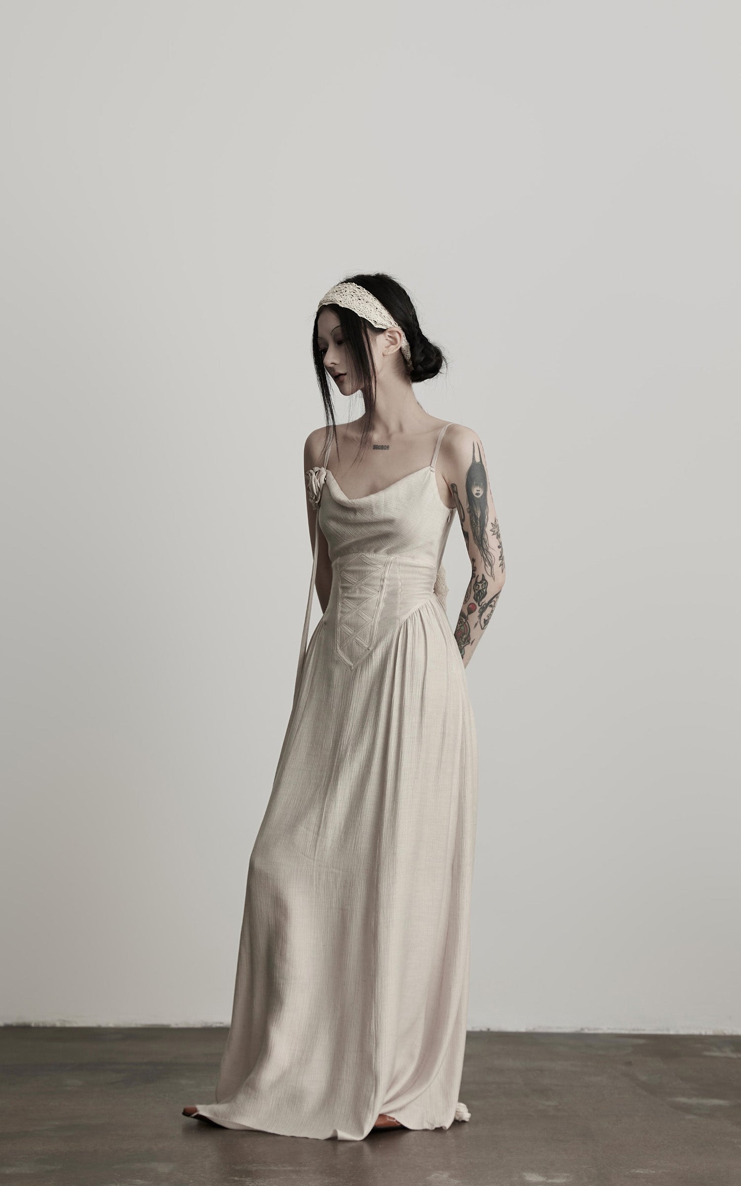 DOINDULGE Draped Maxi Dress with Corset Waist and Rosette Detail
