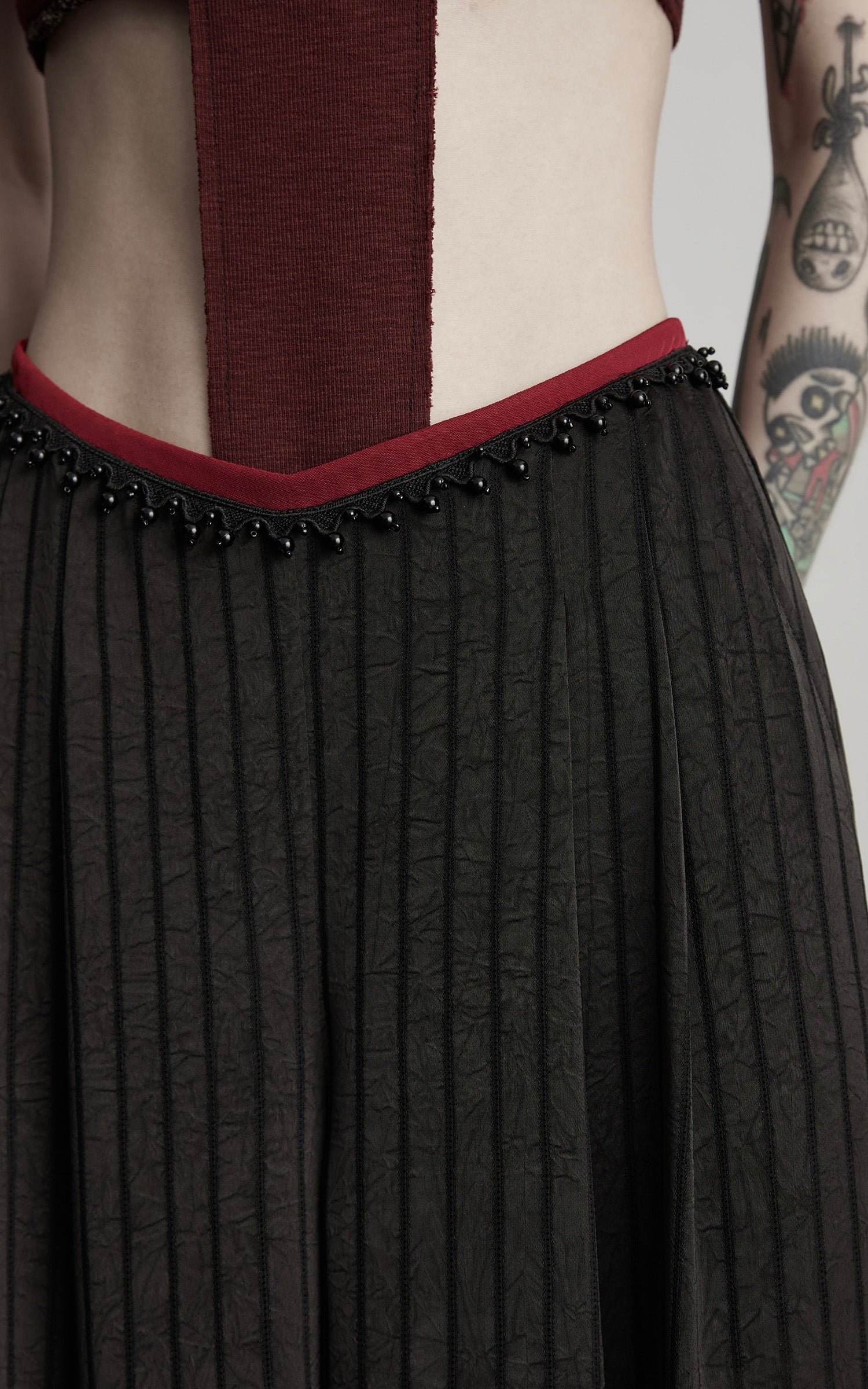 DOINDULGE Ruched Wide-Leg Pants with V-Cut Waist and Beaded Trim
