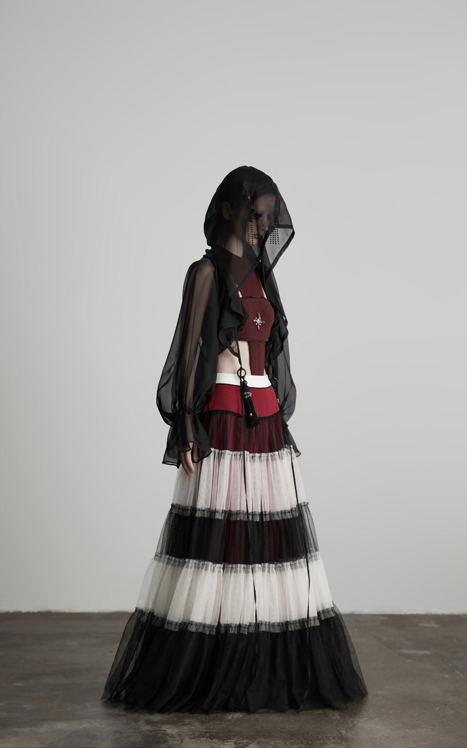 DOINDULGE Draped Mesh Hooded Cardigan with Tassel Accents and Voluminous Sleeves