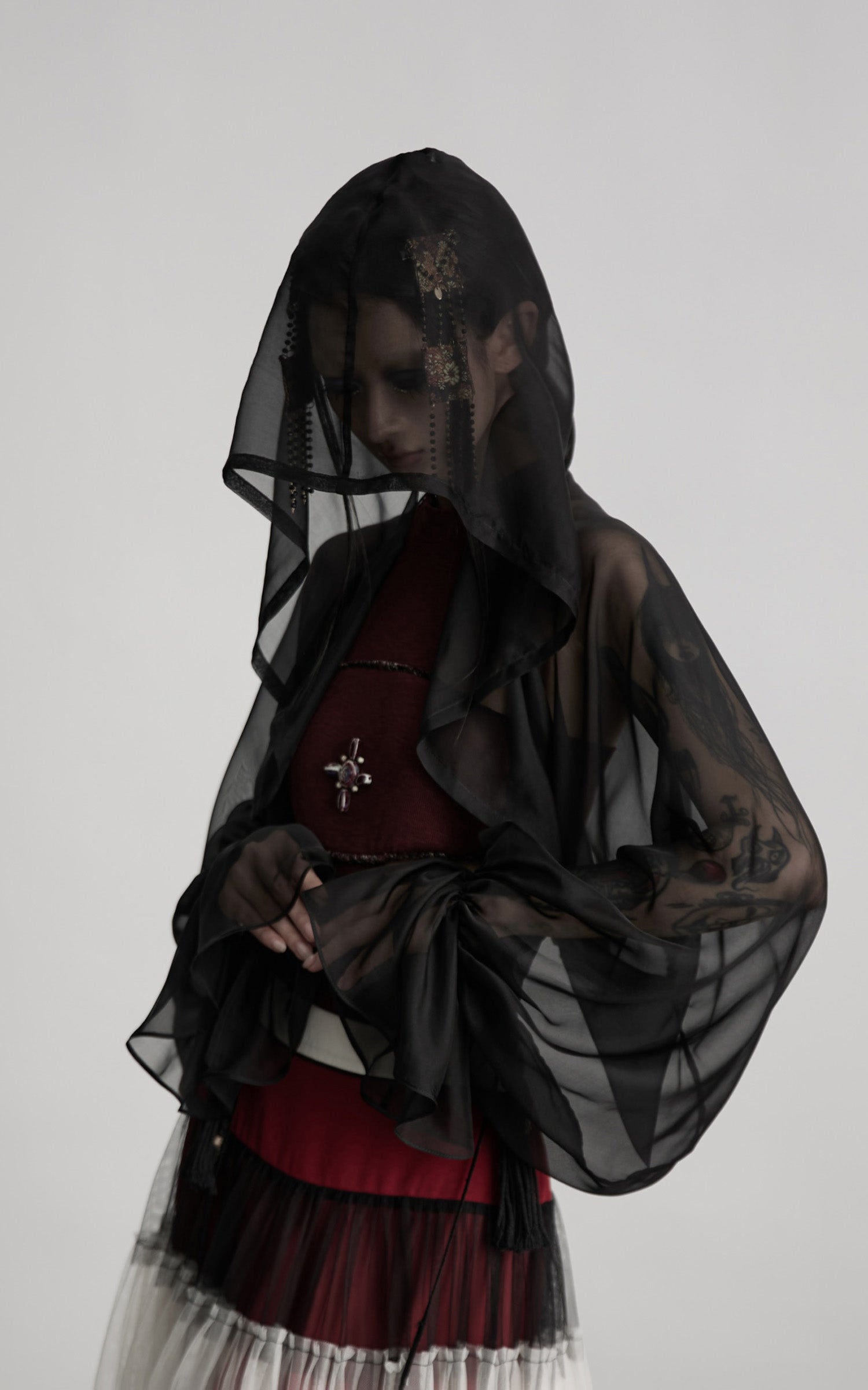 DOINDULGE Draped Mesh Hooded Cardigan with Tassel Accents and Voluminous Sleeves