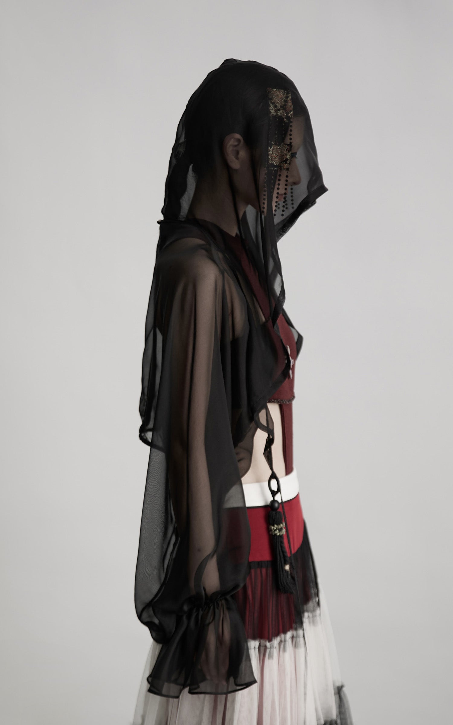 DOINDULGE Draped Mesh Hooded Cardigan with Tassel Accents and Voluminous Sleeves