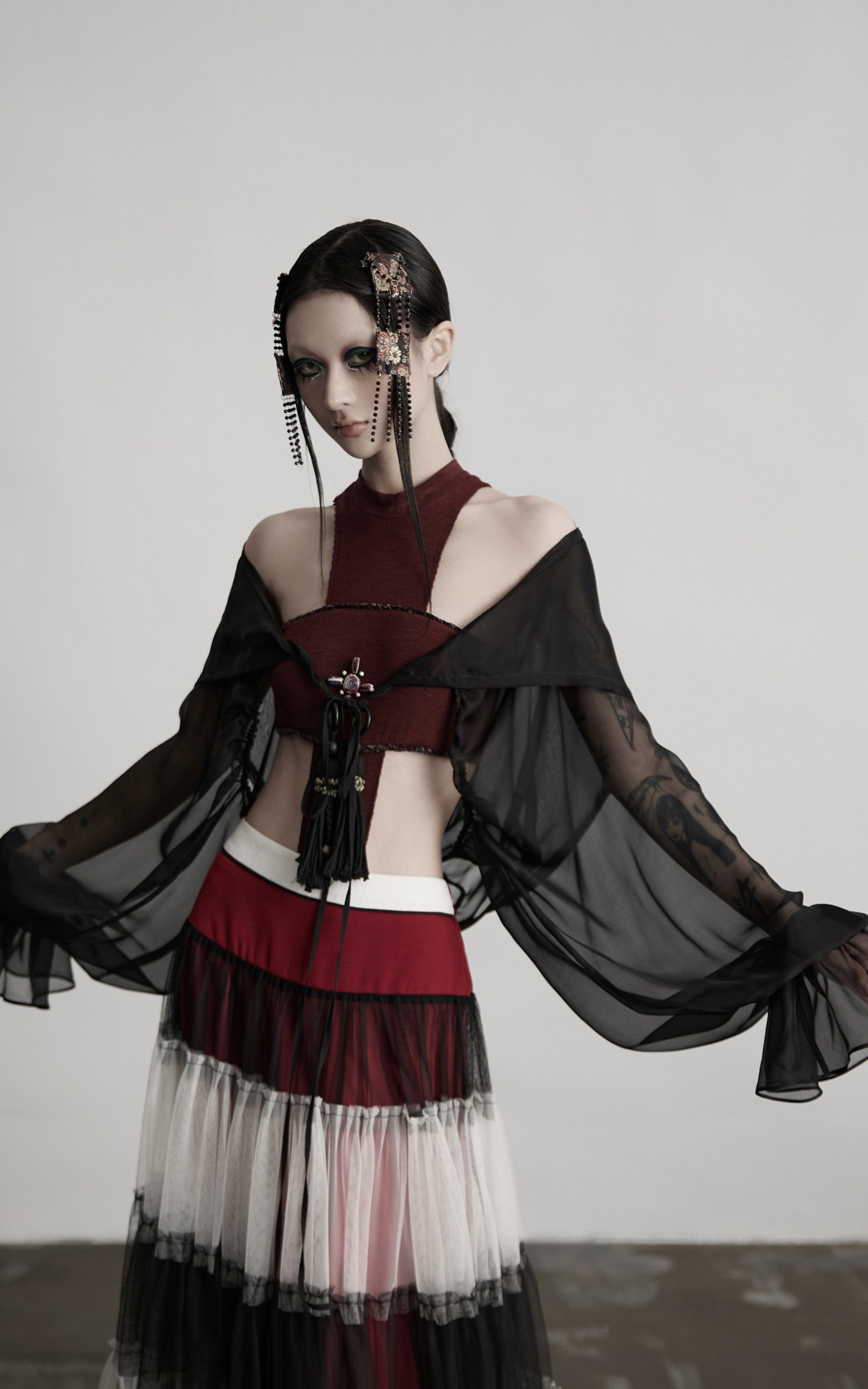 DOINDULGE Draped Mesh Hooded Cardigan with Tassel Accents and Voluminous Sleeves