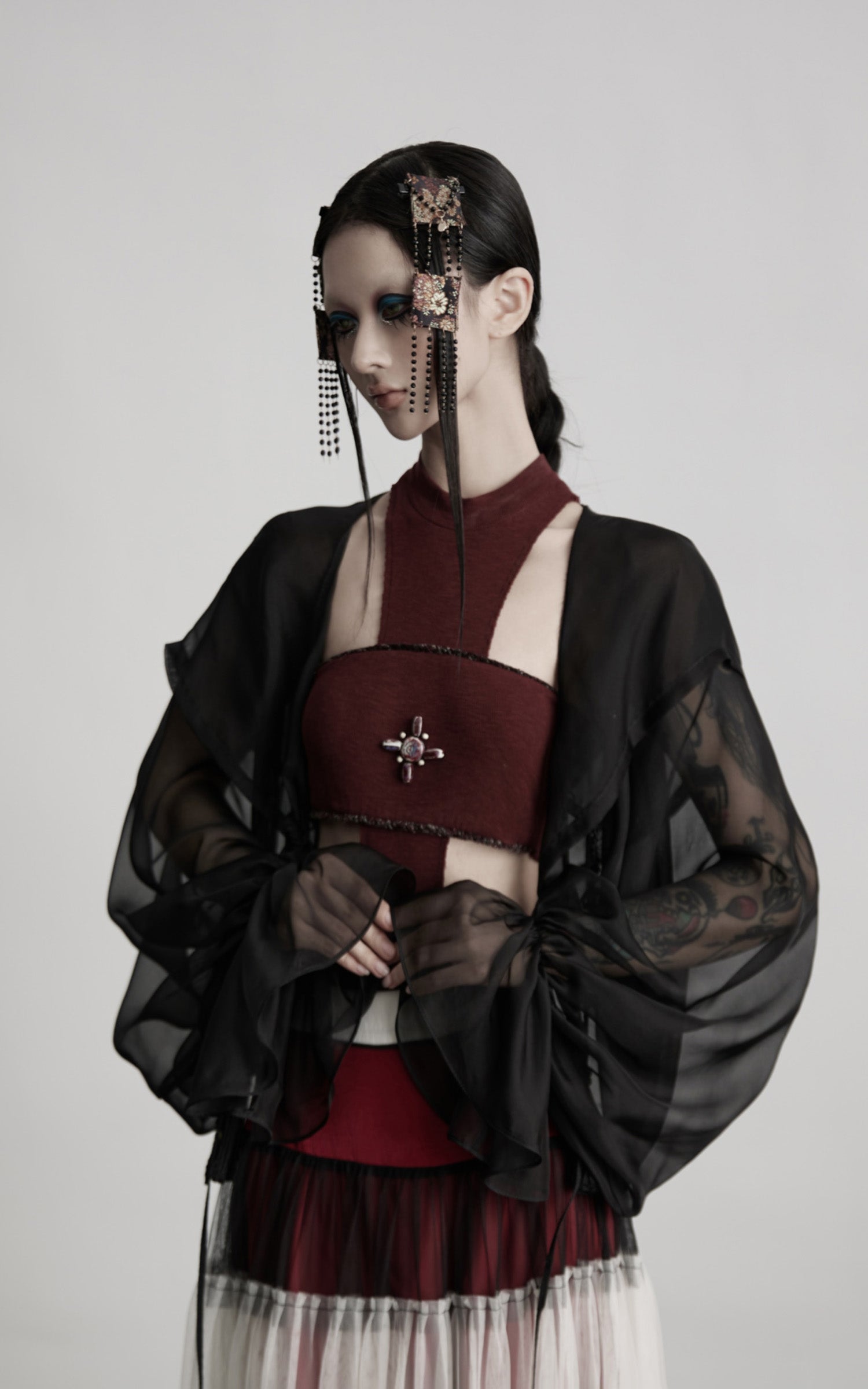 DOINDULGE Draped Mesh Hooded Cardigan with Tassel Accents and Voluminous Sleeves