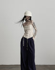 DOINDULGE Wide-Leg Pants with Contrast Waistband and Bead Detail