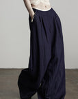 DOINDULGE Wide-Leg Pants with Contrast Waistband and Bead Detail