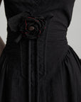 DOINDULGE Draped Maxi Dress with Corset Waist and Rosette Detail