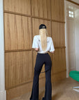 Rase le sol High-Waisted Stretch Flared Pants with Asymmetric Wrap Tie Detail - PINKPARKS
