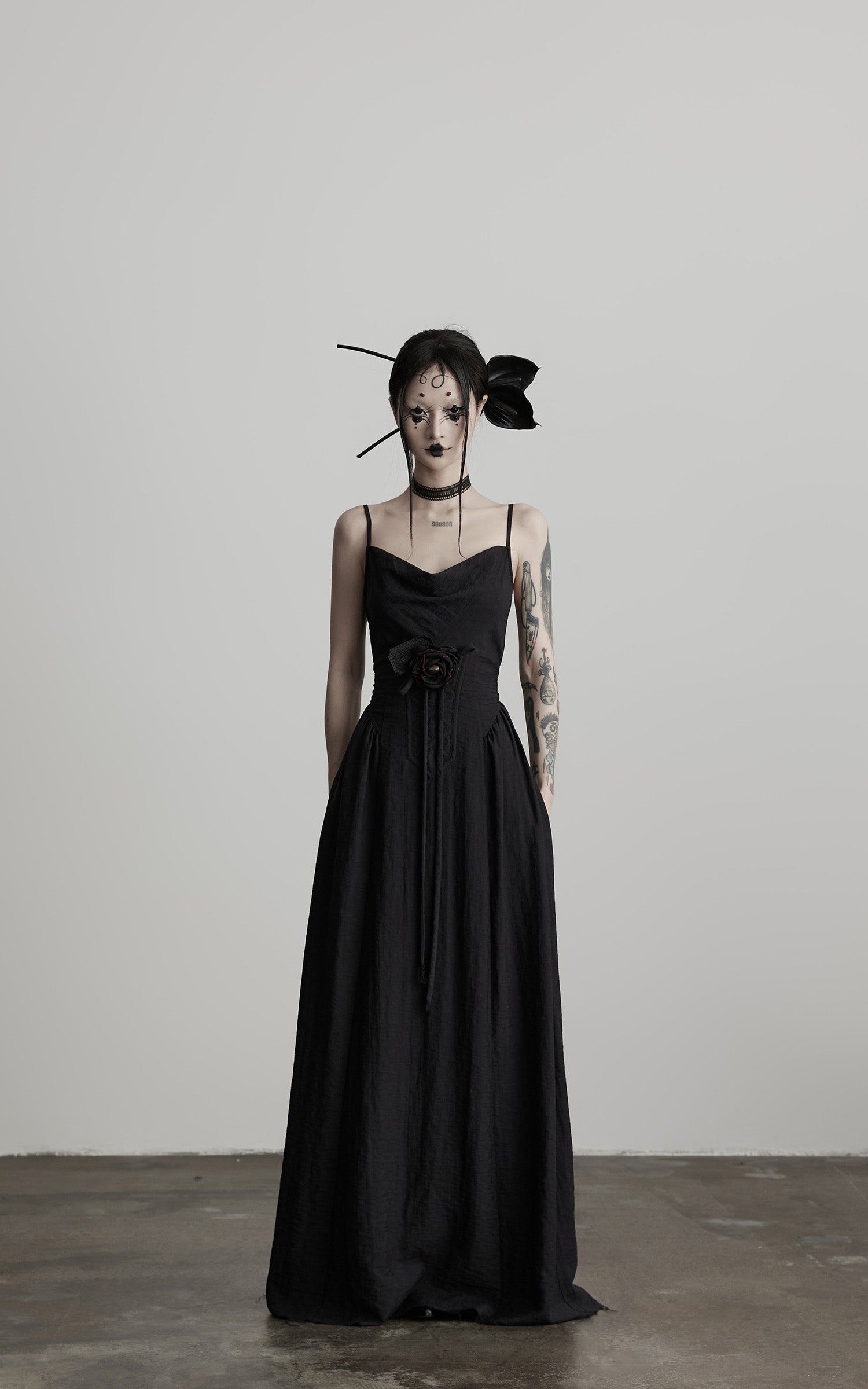 DOINDULGE Draped Maxi Dress with Corset Waist and Rosette Detail