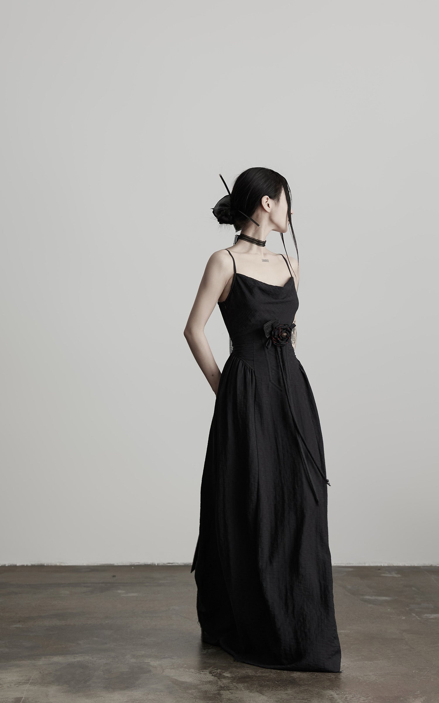 DOINDULGE Draped Maxi Dress with Corset Waist and Rosette Detail