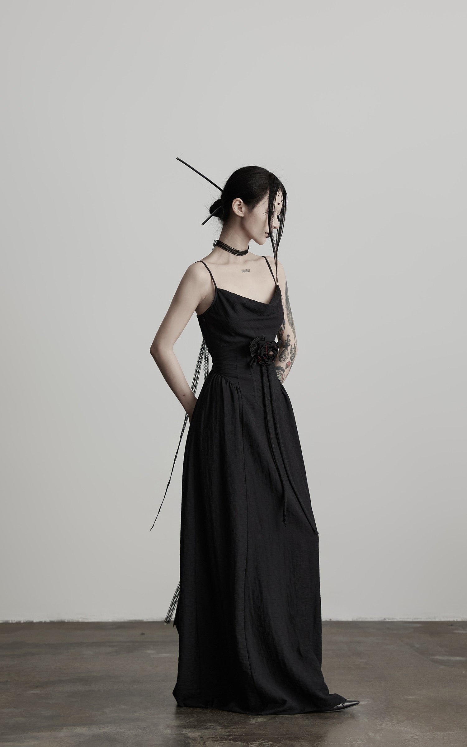 DOINDULGE Draped Maxi Dress with Corset Waist and Rosette Detail